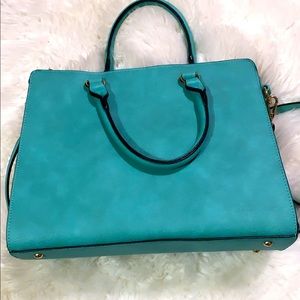 Turquoise blue handbag